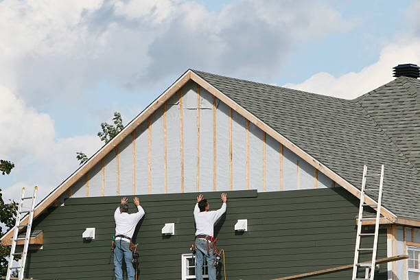 Professional Emergency Siding Repair technician working in New Hyde Park, NY